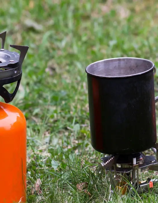 Two-camping-gas-stoves-stand-on-the-grass