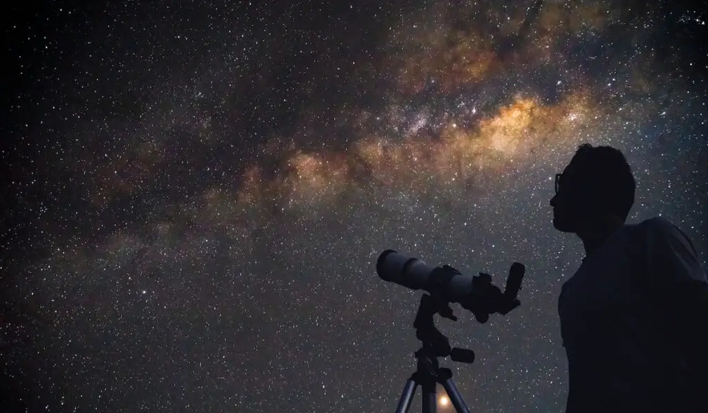 man with a telescope watching stars, Stargazing concept 