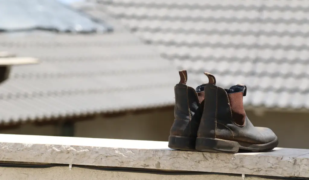 boots on the roof under the sunlight