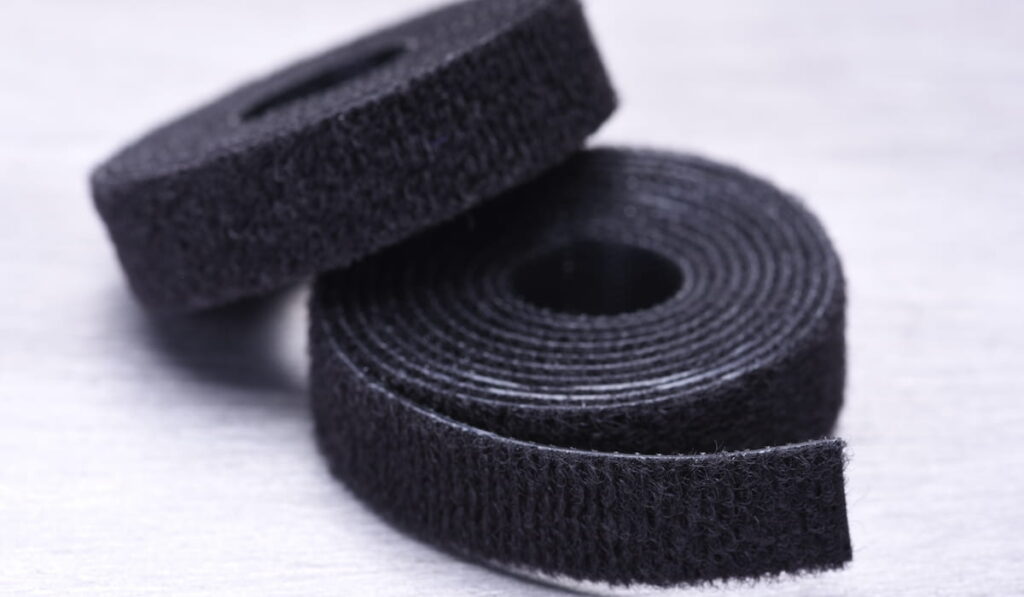 Roll of Velcro Tape on Gray Metal Surface