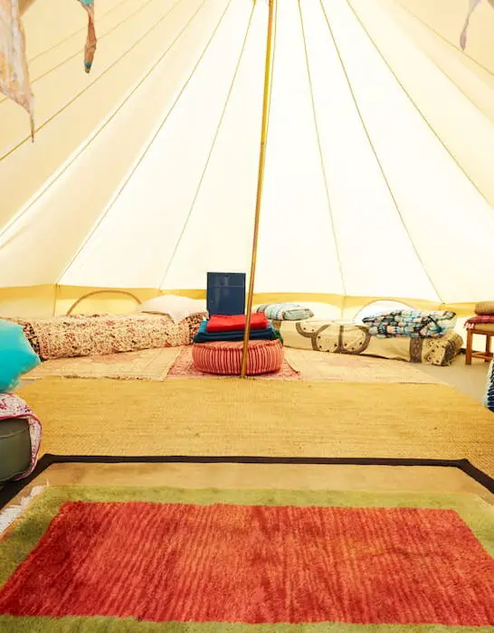 interior-view-of-teepee-tent-pitched-on-glamping