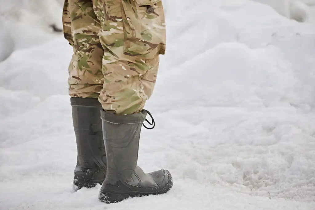  rubber boots on the snow in winter